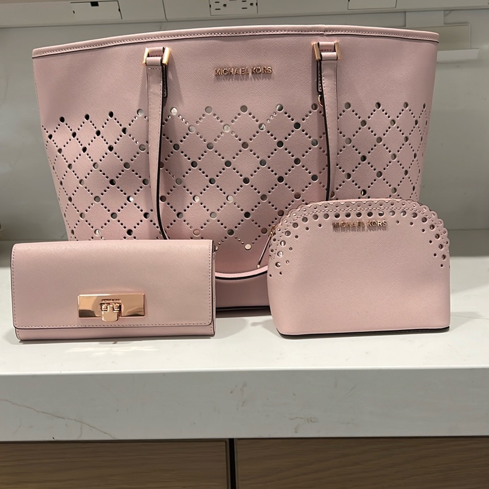 Michael Kors, purse, wallet, and accessory bag.